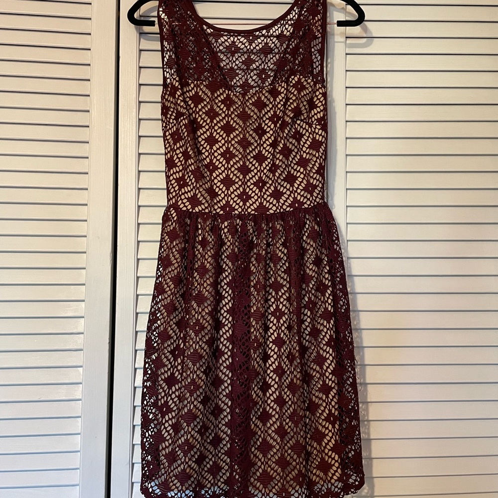 City Trends Fancy dress with an overlay of maroon fabric